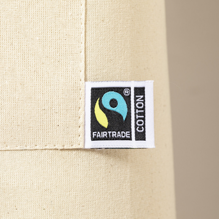 Delantal Zowi Fairtrade de línea nature, fabricado en 100% algodón de 180g/m2 en tono natural. Delantales de algodón promocionales personalizados. Regalos de empresa y corporativos personalizados