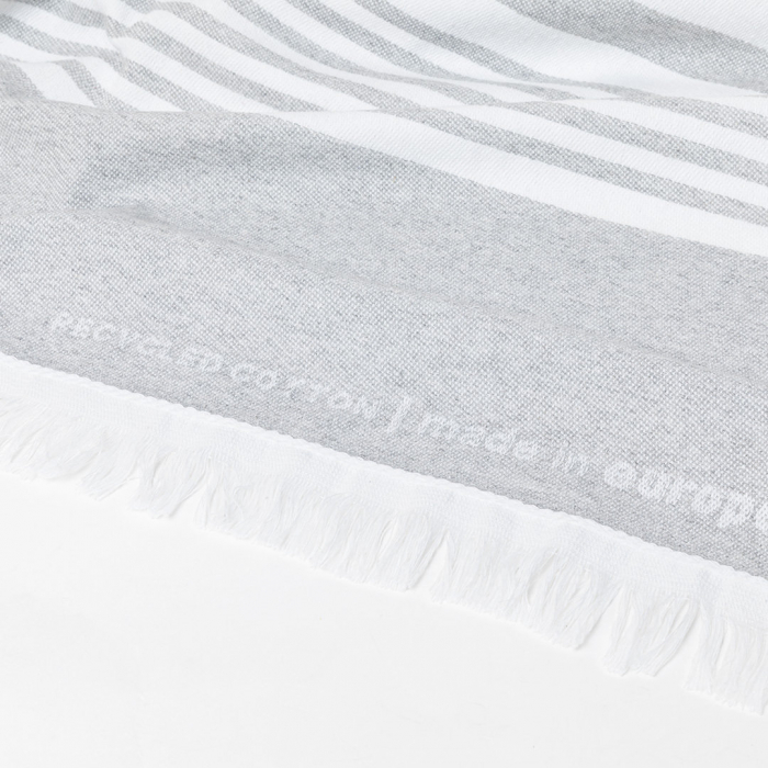 Pareo Toalla Yisper de línea nature y acabado gris. Tamaño 150 x 80 cm. Pareos toallas promocionales personalizadas para el verano. Regalos de empresa y corporativos personalizados