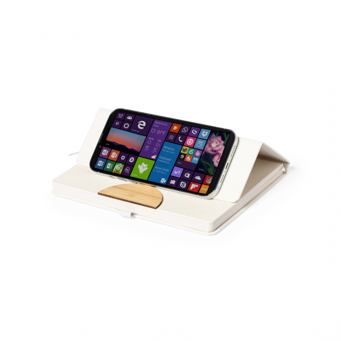 Libreta Soporte Torya convertible en soporte para smartphone y fabricada con cartones de leche reciclados. Libretas con materiales reciclados promocionales personalizadas. Regalos de empresa y corporativos personalizados
