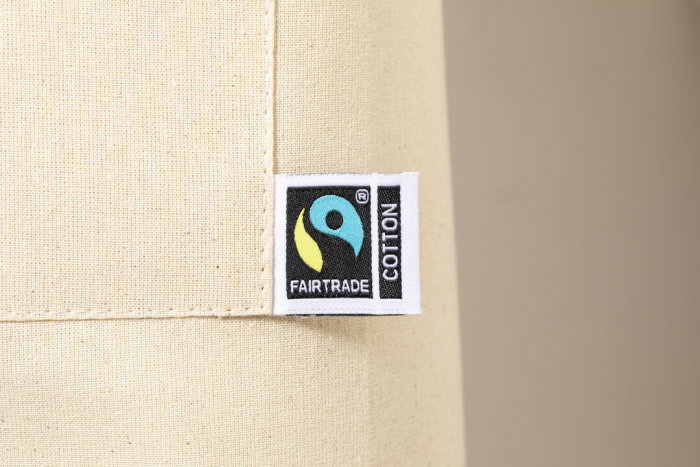 Delantal Zowi Fairtrade de línea nature, fabricado en 100% algodón de 180g/m2 en tono natural. Delantales de algodón promocionales personalizados. Regalos de empresa y corporativos personalizados