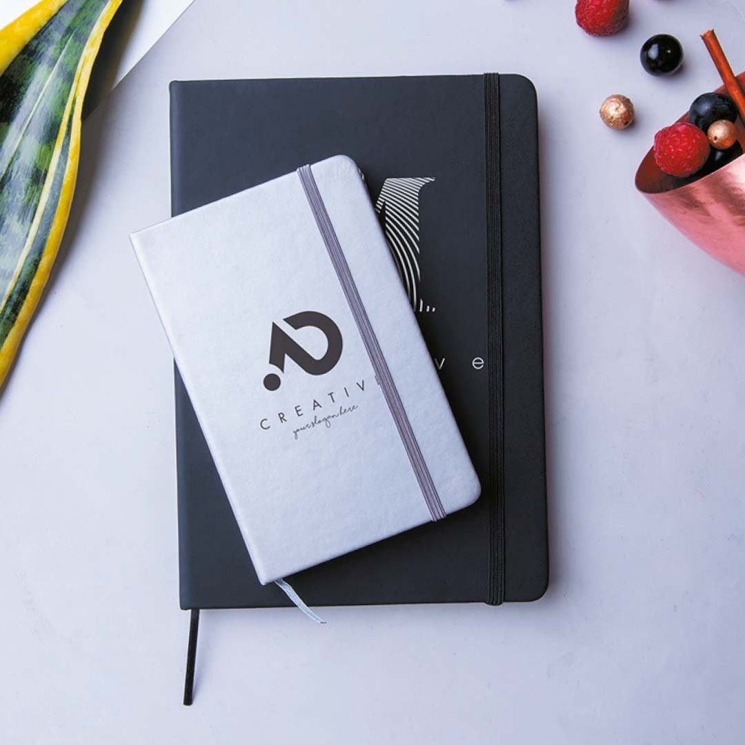 Blocks de notas y cuadernos personalizados con logo